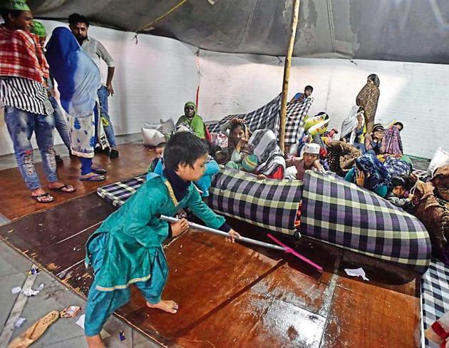 On Thursday evening, after the first spell of heavy rains hit Delhi, large parts of the relied camp were flooded, affecting mattresses and other belongings of the residents. (Photo: Sonu Mehta/HT PHOTO) On Thursday evening, after the first spell of heavy rains hit Delhi, large parts of the relied camp were flooded, affecting mattresses and other belongings of the residents. (Photo: Sonu Mehta/HT PHOTO)