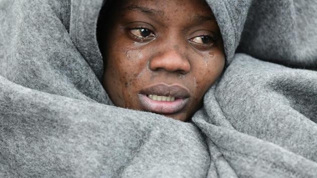 A migrant cries as she tries to warm herself as she and others arrive at the village of Skala Sikaminias, on the Greek island of Lesbos, after crossing the Aegean sea from Turkey. Hundreds of refugees and migrants in Turkey have begun heading for the country's land and sea borders with Greece, buoyed by Turkish officials' statements indicating they will not be hindered from crossing the frontier to head into Europe. (Michael Varaklas / AP) A migrant cries as she tries to warm herself as she and others arrive at the village of Skala Sikaminias, on the Greek island of Lesbos, after crossing the Aegean sea from Turkey. Hundreds of refugees and migrants in Turkey have begun heading for the country's land and sea borders with Greece, buoyed by Turkish officials' statements indicating they will not be hindered from crossing the frontier to head into Europe. (Michael Varaklas / AP)