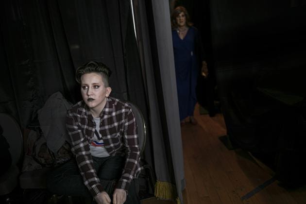 Leon Dell'era, 15, left, waits backstage for his turn to walk the runway while Lisa Smith, 70, emerges from the dressing rooms in Boston, USA. For many years, the TransFORMED fashion show featured male-to-female crossdressers. But over time, the focus has become less about the clothes, and more about the people in them. (Wong Maye-E / AP) Leon Dell'era, 15, left, waits backstage for his turn to walk the runway while Lisa Smith, 70, emerges from the dressing rooms in Boston, USA. For many years, the TransFORMED fashion show featured male-to-female crossdressers. But over time, the focus has become less about the clothes, and more about the people in them. (Wong Maye-E / AP)