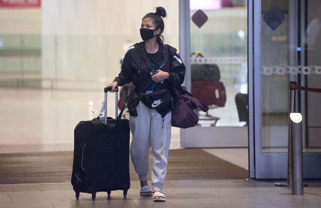People wearing face mask as part of preventive measures for the deadly Coronavirus, arriving from different foreign countries at Chhatrapati Shivaji Maharaj International Airport in Mumbai, India, on Wednesday, March 4, 2020. (Satyabrata Tripathy/HT Photo) People wearing face mask as part of preventive measures for the deadly Coronavirus, arriving from different foreign countries at Chhatrapati Shivaji Maharaj International Airport in Mumbai, India, on Wednesday, March 4, 2020. (Satyabrata Tripathy/HT Photo)