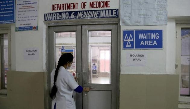 A doctor at outside an isolation ward at a government hospital in Jammu to treat people suspected of coronavirus infection.(AP) A doctor at outside an isolation ward at a government hospital in Jammu to treat people suspected of coronavirus infection.(AP)