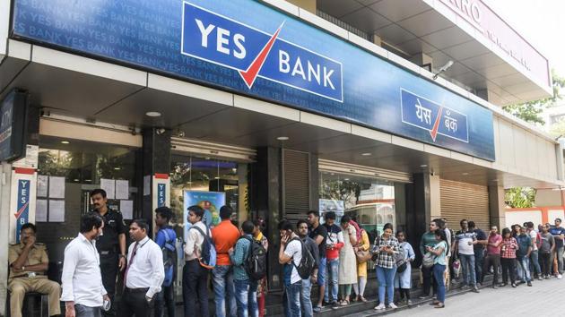 Panicked Yes Bank customers were seen queuing up at the bank’s ATMs at various locations(HT PHOTO)
