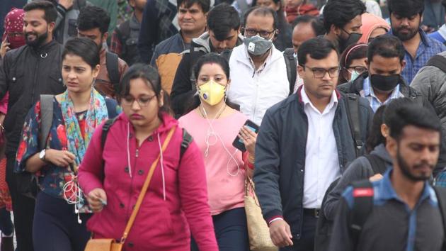 People seen wearing protective masks following multiple positive cases of coronavirus in the country, at near Honda City Centre Metro Station, in Gurugram, India, on Frisday, 06 March 2020. (Yogendra Kumar/HT PHOTO) People seen wearing protective masks following multiple positive cases of coronavirus in the country, at near Honda City Centre Metro Station, in Gurugram, India, on Frisday, 06 March 2020. (Yogendra Kumar/HT PHOTO)