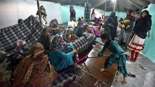 A child wipes the floor inside a relief camp, at Eidgah, Mustafabad. The residents in the camp are people whose homes were torched by violent mobs last week. “Any infection at this point could be a life threat. And it will spread easily,” said Shabnam Akhtar, one of the residents of the camp, as she took a paracetamol for her sister-in-law from one of the three makeshift medical camps set up inside the Eidgah premises. (Sonu Mehta / HT Photo) A child wipes the floor inside a relief camp, at Eidgah, Mustafabad. The residents in the camp are people whose homes were torched by violent mobs last week. “Any infection at this point could be a life threat. And it will spread easily,” said Shabnam Akhtar, one of the residents of the camp, as she took a paracetamol for her sister-in-law from one of the three makeshift medical camps set up inside the Eidgah premises. (Sonu Mehta / HT Photo)