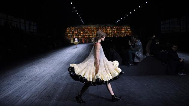 A model presents a creation for Louis Vuitton during the Women's Fall-Winter 2020-2021 Ready-to-Wear collection fashion show in Paris, France. (Anne-Christine Poujoulat / AFP) A model presents a creation for Louis Vuitton during the Women's Fall-Winter 2020-2021 Ready-to-Wear collection fashion show in Paris, France. (Anne-Christine Poujoulat / AFP)