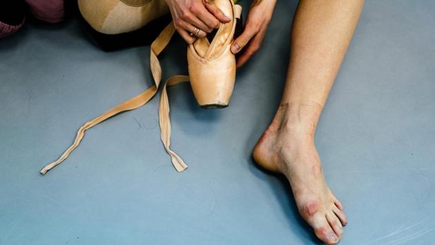 Dancer Alexandra Kirshina rehearses on pointes made at Grishko company especially for her in Moscow, Russia. Born in the chaos of the collapse of the Soviet Union, the Grishko family business has emerged among the top makers in the world of dance shoes, notably classic ballet pointe shoes, worn on the world's great stages. (Dimitar Dilkoff / AFP) Dancer Alexandra Kirshina rehearses on pointes made at Grishko company especially for her in Moscow, Russia. Born in the chaos of the collapse of the Soviet Union, the Grishko family business has emerged among the top makers in the world of dance shoes, notably classic ballet pointe shoes, worn on the world's great stages. (Dimitar Dilkoff / AFP)