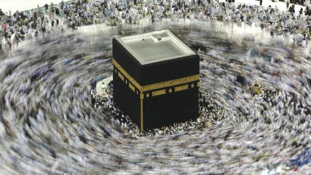 In this picture taken with a slow shutter speed, far smaller crowds than usual of Muslim pilgrims circumambulate the Kaaba, the cubic building at the Grand Mosque, in the Muslim holy city of Mecca, Saudi Arabia. The coronavirus outbreak disrupted Islamic worship in the Middle East as Saudi Arabia banned its citizens and other residents of the kingdom from performing the pilgrimage in Mecca, while Iran cancelled Friday prayers in major cities. (Amr Nabil / AP) In this picture taken with a slow shutter speed, far smaller crowds than usual of Muslim pilgrims circumambulate the Kaaba, the cubic building at the Grand Mosque, in the Muslim holy city of Mecca, Saudi Arabia. The coronavirus outbreak disrupted Islamic worship in the Middle East as Saudi Arabia banned its citizens and other residents of the kingdom from performing the pilgrimage in Mecca, while Iran cancelled Friday prayers in major cities. (Amr Nabil / AP)
