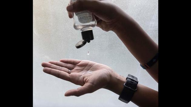 A girl uses a hand sanitizer after cases of coronavirus in the country, in Pune, Maharashtra. (Pratham Gokhale / HT Photo) A girl uses a hand sanitizer after cases of coronavirus in the country, in Pune, Maharashtra. (Pratham Gokhale / HT Photo)