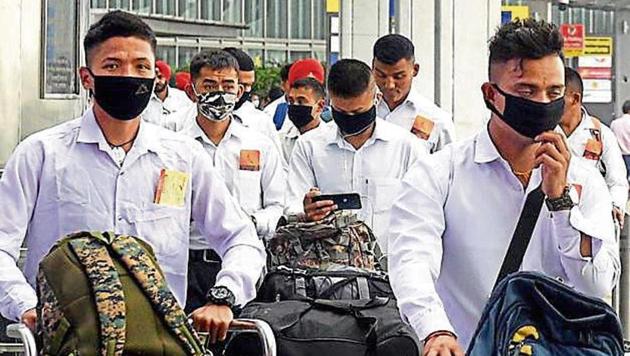 Passengers wearing masks arrive at the NSCBI Airport in Kolkata on Saturday. (PTI photo) Passengers wearing masks arrive at the NSCBI Airport in Kolkata on Saturday. (PTI photo)