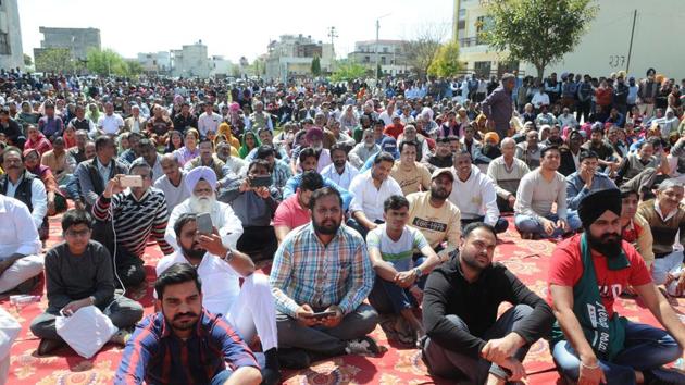 Residents of areas that face demolitions following the Punjab and Haryana high court’s order attending a meeting in Kansal on Sunday. Around 2,000 families are expected to be affected in Kansal alone.