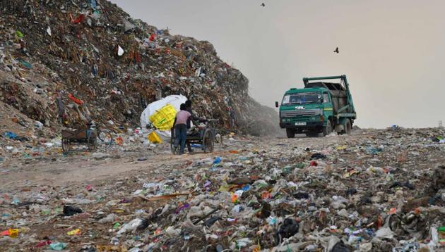 According to MC, the plant is processing only 25% of the daily waste generated by the city, while the remaining is illegally dumped in the open dumping ground opposite the plant in Dadumajra.(HT PHOTO)