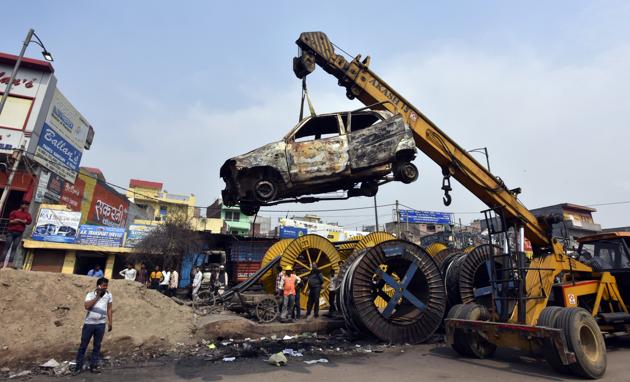 Charred vehicles following violent clashes in North East Delhi over the amended citizenship law at north-east Delhi’s Chand Bagh. (Sonu Mehta/HT PHOTO) Charred vehicles following violent clashes in North East Delhi over the amended citizenship law at north-east Delhi’s Chand Bagh. (Sonu Mehta/HT PHOTO)
