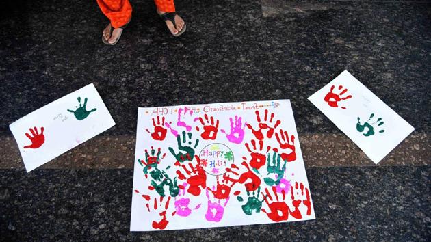 An artwork, created by children affected by AIDS, as part of Holi celebrations by Aho Maa Charitable Trust, at Navi Mumbai Municipal Corporation (NMMC) Hospital, at Vashi in Navi Mumbai, Maharashtra. (Bachchan Kumar / HT Photo) An artwork, created by children affected by AIDS, as part of Holi celebrations by Aho Maa Charitable Trust, at Navi Mumbai Municipal Corporation (NMMC) Hospital, at Vashi in Navi Mumbai, Maharashtra. (Bachchan Kumar / HT Photo)