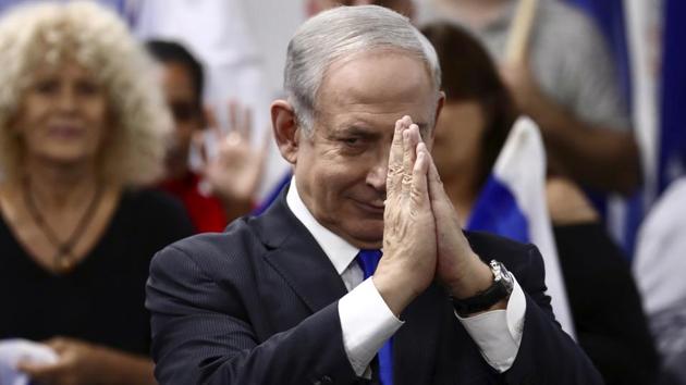 Israeli Prime Minister and head of the Likud party Benjamin Netanyahu reacts after delivering a statement in Petah Tikva. (AP) Israeli Prime Minister and head of the Likud party Benjamin Netanyahu reacts after delivering a statement in Petah Tikva. (AP)