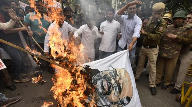Members of Indian Youth Congress protest against Home Minister Amit Shah, seeking his immediate resignation for abdication of duty during the communal violence in north- east Delhi over CAA, in New Delhi. (Sanjeev Verma / HT Photo) Members of Indian Youth Congress protest against Home Minister Amit Shah, seeking his immediate resignation for abdication of duty during the communal violence in north- east Delhi over CAA, in New Delhi. (Sanjeev Verma / HT Photo)