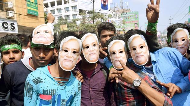 JD(U) supporters seen wearing masks of Bihar Chief Minister and JD(U) national president Nitish Kumar during a procession towards Gandhi Maidan for attending Kumar’s rally for state-level party workers, in Patna, Bihar. (Santosh Kumar / HT Photo) JD(U) supporters seen wearing masks of Bihar Chief Minister and JD(U) national president Nitish Kumar during a procession towards Gandhi Maidan for attending Kumar’s rally for state-level party workers, in Patna, Bihar. (Santosh Kumar / HT Photo)