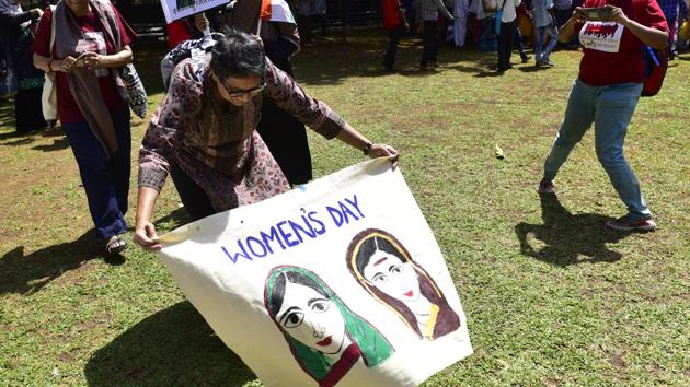 Members of different organizations display placards and banners to celebrate Women's Day in Mumbai. (Anshuman Poyrekar/ Hindustan Times) Members of different organizations display placards and banners to celebrate Women's Day in Mumbai. (Anshuman Poyrekar/ Hindustan Times)