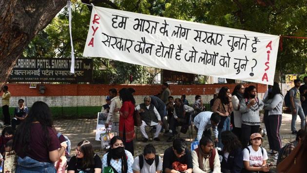 People are seated as a banner is seen during ‘Young India March,’ a protest march against Citizenship Amendment Act (CAA) and the recent communal violence in the national capital, at Jantar Mantar, in New Delhi. (Vipin Kumar / HT Photo) People are seated as a banner is seen during ‘Young India March,’ a protest march against Citizenship Amendment Act (CAA) and the recent communal violence in the national capital, at Jantar Mantar, in New Delhi. (Vipin Kumar / HT Photo)