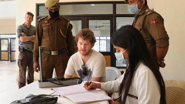 A German tourist undergoes a screening test on Jammu-Pathankot National Highway on March 4.(PTI photo)