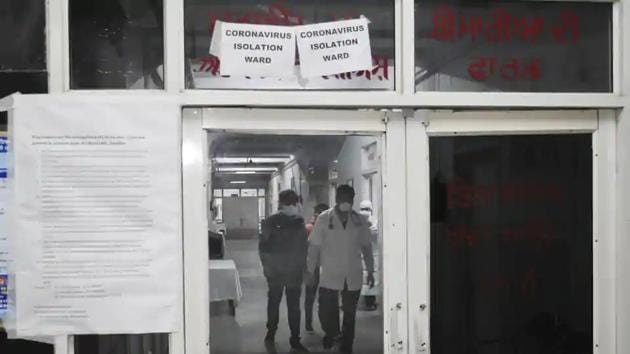 Doctors wearing masks and protective gear as they are seen inside isolation ward of Guru Nanak Dev Hospital, in Amritsar, India, on Saturday, March 07, 2020. (HT Photo/Sameer Sehgal) Doctors wearing masks and protective gear as they are seen inside isolation ward of Guru Nanak Dev Hospital, in Amritsar, India, on Saturday, March 07, 2020. (HT Photo/Sameer Sehgal)