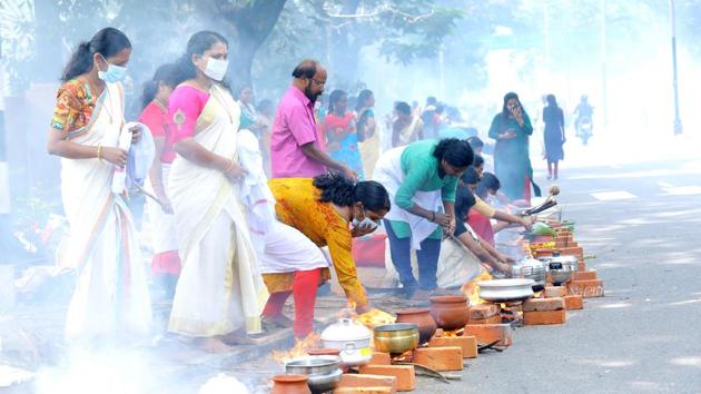 Women seen wearing face masks amid rising coronavirus scare, as they celebrate the Attukal Pongala festival in Thiruvananthapuram, Kerala, on Monday, March 9, 2020. (Vivek R Nair / HT Photo) Women seen wearing face masks amid rising coronavirus scare, as they celebrate the Attukal Pongala festival in Thiruvananthapuram, Kerala, on Monday, March 9, 2020. (Vivek R Nair / HT Photo)