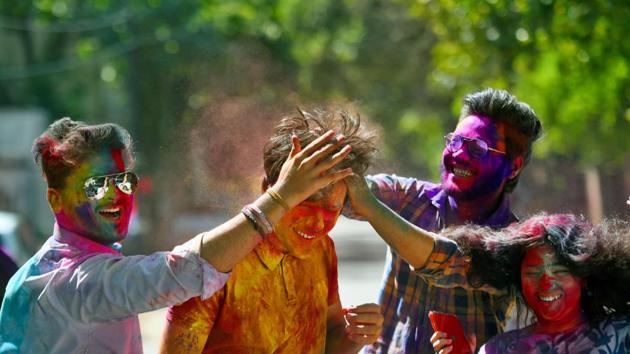 Friends enjoying celebrating Holi with each other. (Amal KS/HT PHOTO) Friends enjoying celebrating Holi with each other. (Amal KS/HT PHOTO)