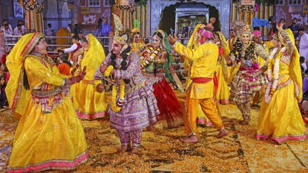 Artists perform at the Govind Dev Ji Temple in Jaipur, Rajasthan. According to Hindu mythology, Lord Krishna visited his beloved Radha’s town Barsana from Nandgaon in Mathura to celebrate Holi with her. (PTI) Artists perform at the Govind Dev Ji Temple in Jaipur, Rajasthan. According to Hindu mythology, Lord Krishna visited his beloved Radha’s town Barsana from Nandgaon in Mathura to celebrate Holi with her. (PTI)