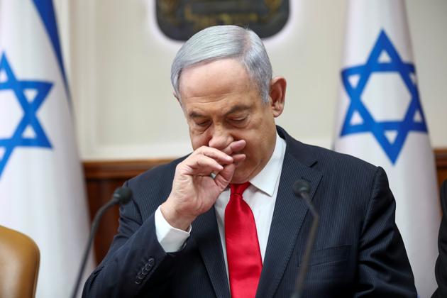 Israeli Prime Minister Benjamin Netanyahu gestures as he chairs the weekly cabinet meeting in Jerusalem, March 8, 2020. Oded Balilty/Pool via Reuters (Pool via Reuters) Israeli Prime Minister Benjamin Netanyahu gestures as he chairs the weekly cabinet meeting in Jerusalem, March 8, 2020. Oded Balilty/Pool via Reuters (Pool via Reuters)