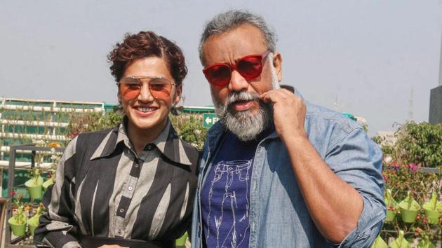 Taapsee Pannu with film director Anubhav Sinha poses for photographs.(PTI)