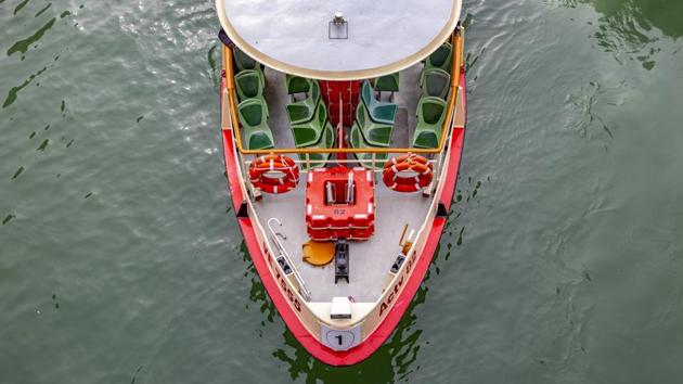 An almost empty Vaporetto boat line vessel passes under a bridge in Venice. (Francesca Volpi / Bloomberg) An almost empty Vaporetto boat line vessel passes under a bridge in Venice. (Francesca Volpi / Bloomberg)