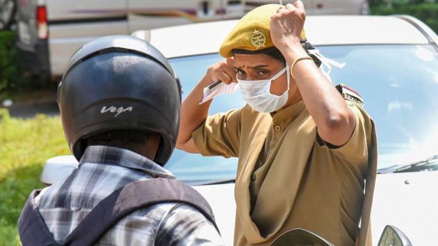 A security personnel wearing masks is seen outside the Special Isolation Ward set up to provide treatment to novel coronavirus patients at Kochi Medical college, in Kerala. (PTI) A security personnel wearing masks is seen outside the Special Isolation Ward set up to provide treatment to novel coronavirus patients at Kochi Medical college, in Kerala. (PTI)