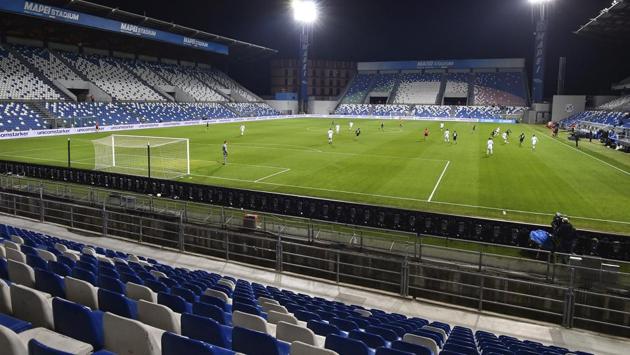 A view of the empty Mapei stadium during the Serie A football match between Sassuolo and Brescia. Large gatherings and outdoor events have been banned, while bars and restaurants will have to close from 6 pm. Schools and universities will remain closed until April 3. (Massimo Paolone / AP) A view of the empty Mapei stadium during the Serie A football match between Sassuolo and Brescia. Large gatherings and outdoor events have been banned, while bars and restaurants will have to close from 6 pm. Schools and universities will remain closed until April 3. (Massimo Paolone / AP)