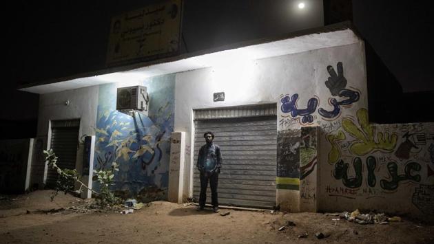 Sudanese activist and artist Youssef al-Sewahly stands next to graffiti he made during last years’ revolution. The government has said that 30% of Sudan’s young people, who make up more than half of the over 42 million population, are without jobs—reported AP. (Nariman El-Mofty / AP) Sudanese activist and artist Youssef al-Sewahly stands next to graffiti he made during last years’ revolution. The government has said that 30% of Sudan’s young people, who make up more than half of the over 42 million population, are without jobs—reported AP. (Nariman El-Mofty / AP)