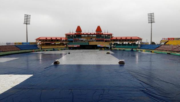 General view of the ground covered as it rains ahead of the match between India and South Africa(REUTERS)