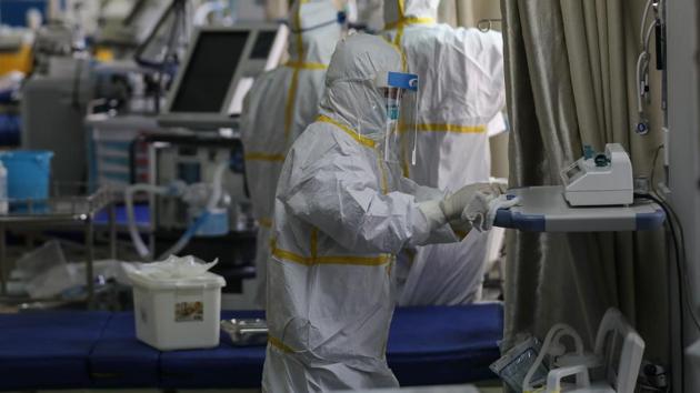 A medical staff member disinfects equipments at a ward used to be an isolation ward for patients infected by the COVID-19 coronavirus at a hospital in Wuhan in China's central Hubei province on March 12, 2020.(AFP file photo) A medical staff member disinfects equipments at a ward used to be an isolation ward for patients infected by the COVID-19 coronavirus at a hospital in Wuhan in China's central Hubei province on March 12, 2020.(AFP file photo)