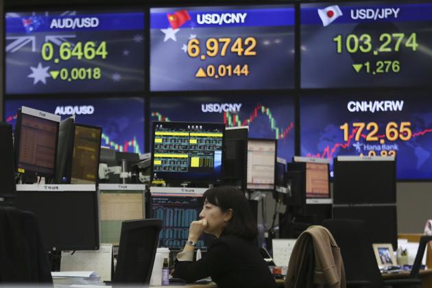 Asian shares, Wall Street indexes sink after WHO declares ...