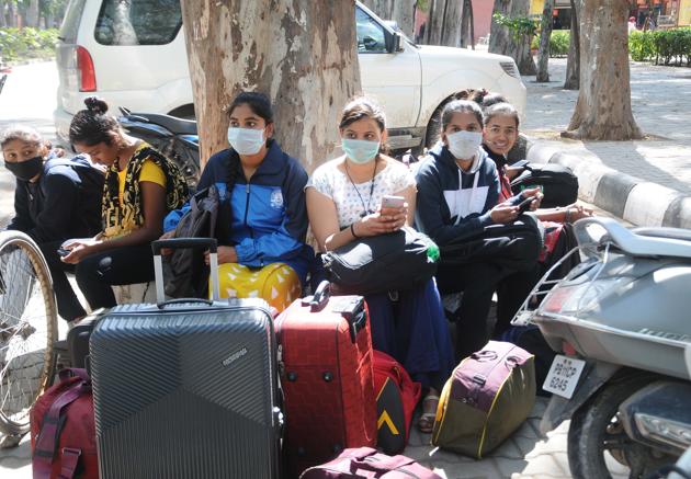 Players coming for the tournament were seen wearing protective masks as a precautionary measure from coronavirus at Punjabi University in Patiala on Friday.(BHARAT BHUSHAN/HT) Players coming for the tournament were seen wearing protective masks as a precautionary measure from coronavirus at Punjabi University in Patiala on Friday.(BHARAT BHUSHAN/HT)