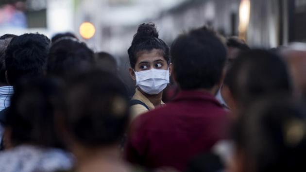 For some time now, scientists have known that the virus spreads through respiratory droplets discharged by an infected person when they cough or sneeze.(Satyabrata Tripathy/HT Photo)