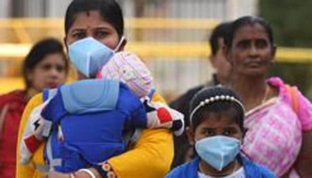 People seen wearing protective face masks as a precautionary measure against Coronavirus(Sanchit Khanna/HT PHOTO)