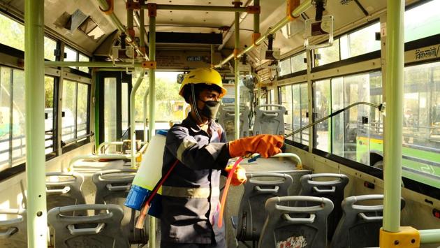 A Delhi Transport Corporation (DTC) employee sprays disinfectant in a bus as a measure against coronavirus, at Rajghat Bus depot in New Delhi. “The government is taking precautionary measures at several levels, and especially in public transport system. To deal with this situation, all the buses and metros are being cleaned with disinfectants,” the government said in a statement. (HT Photo) A Delhi Transport Corporation (DTC) employee sprays disinfectant in a bus as a measure against coronavirus, at Rajghat Bus depot in New Delhi. “The government is taking precautionary measures at several levels, and especially in public transport system. To deal with this situation, all the buses and metros are being cleaned with disinfectants,” the government said in a statement. (HT Photo)