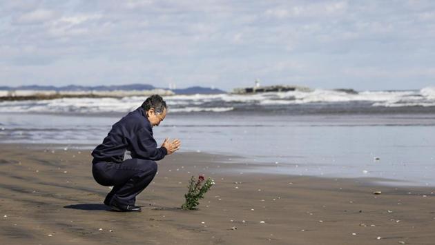 A man prays toward the sea to mourn victims of the March 11, 2011 earthquake and tsunami disaster in Iwaki, Fukushima prefecture, to mark the nine-year anniversary of the disaster. The March 11, 2011, earthquake and tsunami triggered the worst nuclear accident since Chernobyl at Tokyo Electric Power Co’s Fukushima Daiichi plant, 220 kilometers (130 miles) northeast of Tokyo. (Kyodo / REUTERS) A man prays toward the sea to mourn victims of the March 11, 2011 earthquake and tsunami disaster in Iwaki, Fukushima prefecture, to mark the nine-year anniversary of the disaster. The March 11, 2011, earthquake and tsunami triggered the worst nuclear accident since Chernobyl at Tokyo Electric Power Co’s Fukushima Daiichi plant, 220 kilometers (130 miles) northeast of Tokyo. (Kyodo / REUTERS)