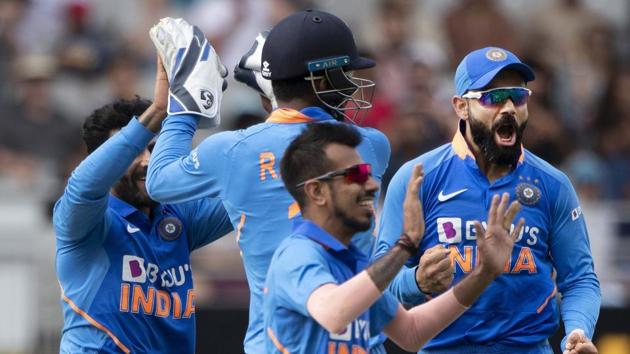 File image of players of Indian cricket team celebrating after the fall of a wicket.(AP)