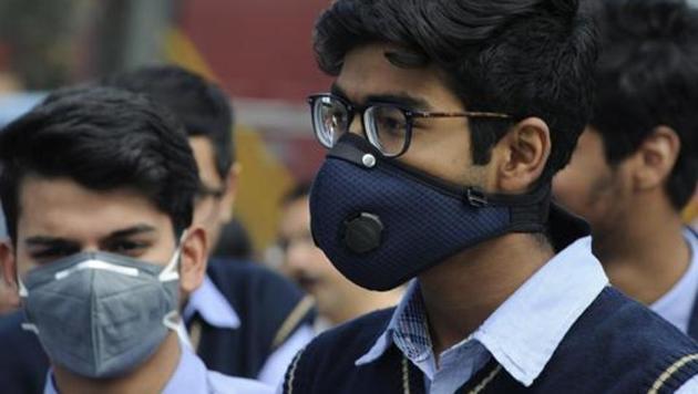 Student wearing a protective mask following multiple positive cases of coronavirus,(HT File) Student wearing a protective mask following multiple positive cases of coronavirus,(HT File)