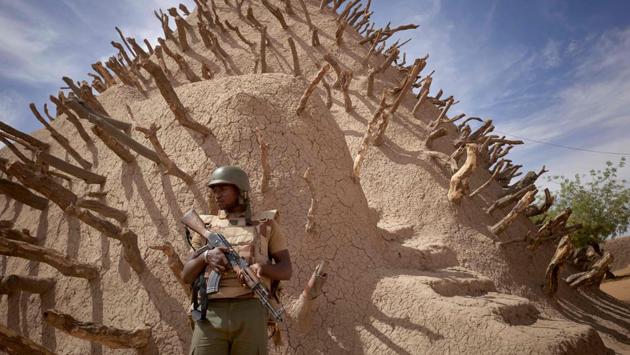 A soldier of the Malian army patrols the archaeological site of the Tomb of Askia in Gao. The site, which was protected during the 10 months of jihadist occupation in 2012, represents one of the finest examples of Sudano-Sahelian architecture in the Sahel region. (AFP) A soldier of the Malian army patrols the archaeological site of the Tomb of Askia in Gao. The site, which was protected during the 10 months of jihadist occupation in 2012, represents one of the finest examples of Sudano-Sahelian architecture in the Sahel region. (AFP)