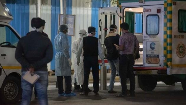 Team of medical staff stand outside the ambulance at Pune International airport to take suspected passengers to the hospital. (Pratham Gokhale/HT File Photo) Team of medical staff stand outside the ambulance at Pune International airport to take suspected passengers to the hospital. (Pratham Gokhale/HT File Photo)