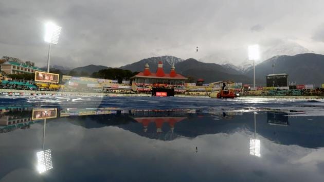 A view of an empty HPCA stadium during the first one-day international cricket match between India and South Africa, in Dharamsala. The match was abandoned without a single ball being bowled due to heavy rain on Thursday. (ANI) A view of an empty HPCA stadium during the first one-day international cricket match between India and South Africa, in Dharamsala. The match was abandoned without a single ball being bowled due to heavy rain on Thursday. (ANI)