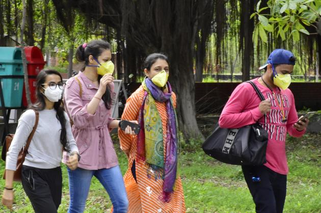 Students seen wearing face masks as a precautionary measure against coronavirus at Guru Nanak Dev University in Amritsar on Saturday.(Sameer Sehgal/HT) Students seen wearing face masks as a precautionary measure against coronavirus at Guru Nanak Dev University in Amritsar on Saturday.(Sameer Sehgal/HT)