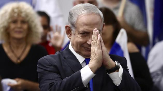 Israeli Prime Minister and head of the Likud party Benjamin Netanyahu reacts after delivering a statement. (AP) Israeli Prime Minister and head of the Likud party Benjamin Netanyahu reacts after delivering a statement. (AP)
