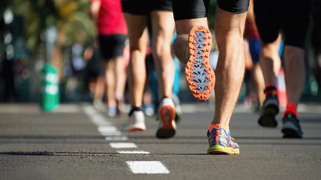 Marathon running race, people feet on city road(Getty Images/iStockphoto)