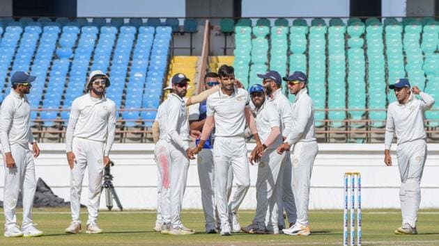 Saurashtra bowler Chirag Jani celebrates after taking wicket.(PTI)